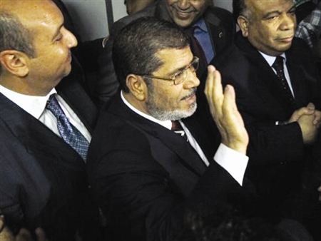 Egypt's Muslim Brotherhood claims presidential victory