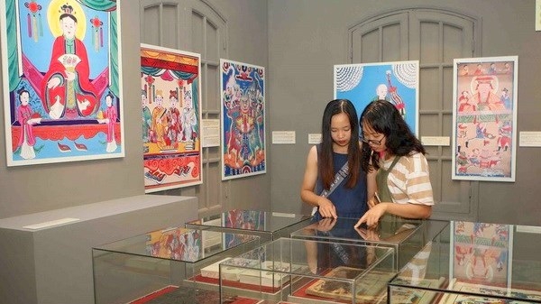 Vietnamese folk paintings on display at the Thang Long Imperial Citadel