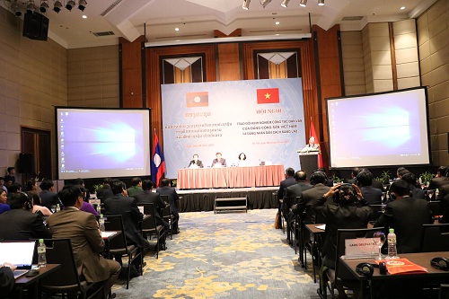 Vietnam, Laos enhance experience on mass mobilization