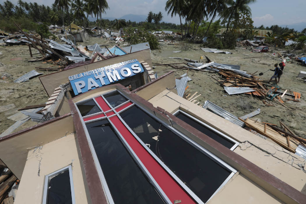 Quake-traumatized Catholics seek solace at Mass