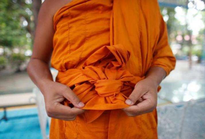 Thai Buddhist Monks Wearing Robes Made from Recycled Plastic Bottles