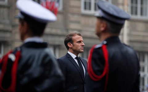 Emmanuel Macron vows fight against Islamist terror amid reports police killer was Isil admirer