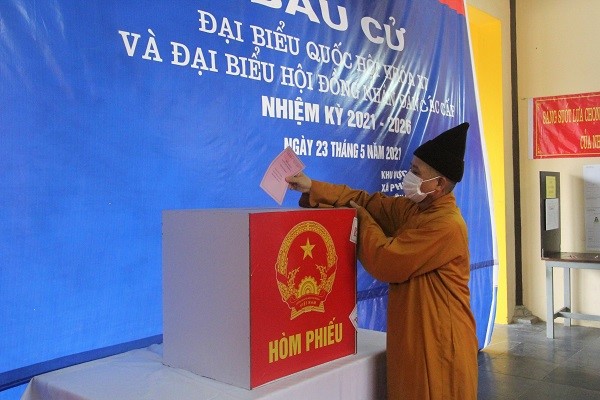 Buddhist dignitaries, student monks and nuns of Vietnam Buddhist Institute in Hanoi cast their vote in national election