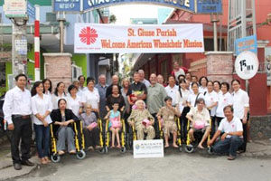 Caritas Ho Chi Minh city Archdiocese and AWM present wheelchairs to poor people