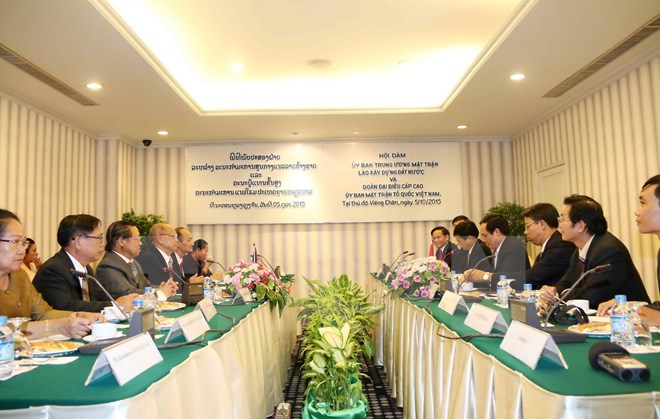 Vietnamese, Lao fronts forge cooperation in ethnic, religious affairs