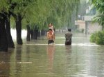 Catholics and Buddhists bring aid to rain-affected North