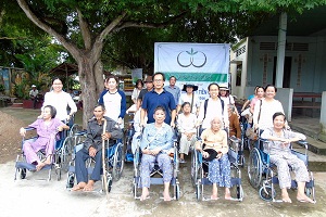 My Tho Caritas presents wheelchairs to people with disabilities