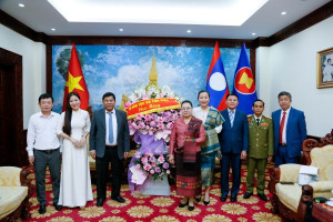 Deputy Minister Y Thông extends congratulations on National Day of Lao People's Democratic Republic