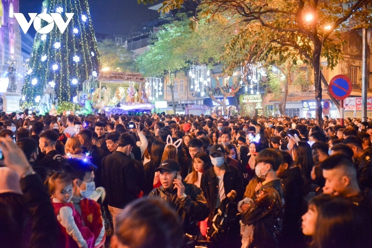 hanoians celebrate christmas of catholics at the cathedral in the capital city in 2020.